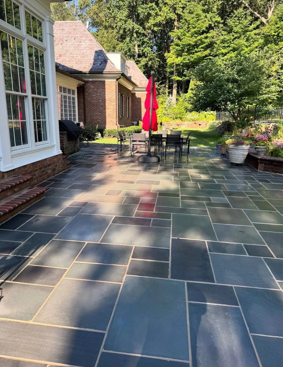 Bluestone patio with outdoor dining area